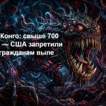Дальнобойщик читает новости о вспышке лихорадки Эбола в Конго на планшете в кабине грузовика